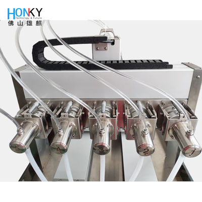 Desktop High Speed 5ml Skin Essential Liquid Filling Machine With Double Lane Mold Filling For Cosmetic Liquid Packing